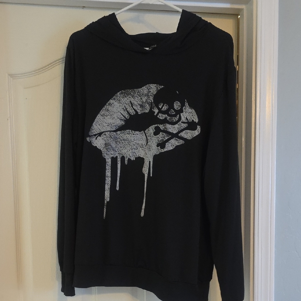Black Drip Graphic Hoodie by [Brand]